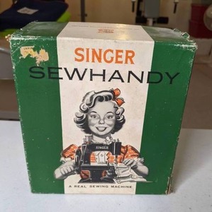 lot 518 image: 1950s Singer Sewhandy Model 20 Beige Sewing Machine in Original Box