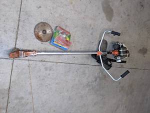lot 6 image: Vintage Brush Cutter 3.0 with Weed Thrasher Attachment