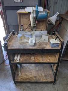 lot 4 image: Makita Saw, Rousseau 2850 Miter Saw Planer Stand, and Shop Vac