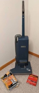 lot 565 image: Vintage Regina Housekeeper Plus Vacuum Cleaner w Accessories