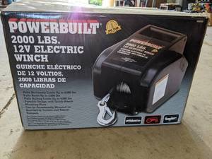 lot 50 image: PowerBuilt 2000lbs 12V Electric Winch