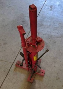 lot 55 image: Vintage Central Machinery Manual Tire Changer