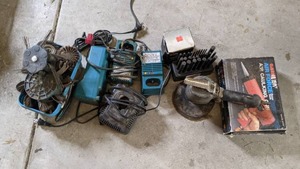 lot 149 image: Lot of Vintage Battery Chargers, Caulking Gun, Transfer Punch Set, Etc