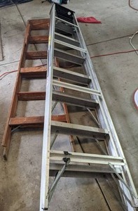 lot 98 image: Keller 8ft Aluminum Ladder and 6ft Wooden Ladder