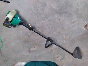 lot 27 image: 2-Cycle Gas Featherlite Weed Eater SST25 17 Cu...