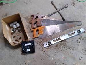 lot 47 image: Hand Saws, Level, Tire Iron , & Mor...