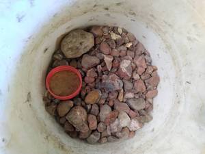 lot 73 image: 5 Gallon Bucket With Rocks Ready f...