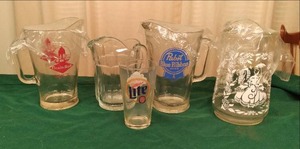 lot 213 image: Vintage Glass Pitchers Grain Belt,...