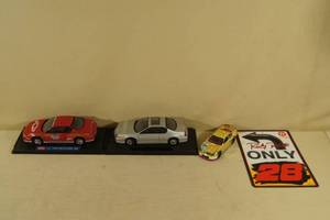 3 Die Cast Cars and a NASCAR Sign