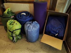 4 sleeping bags, air mattress and pad