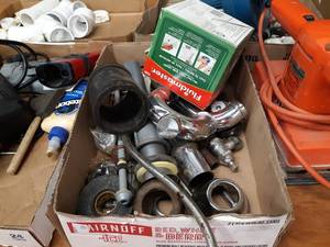 lot 36 image: Black & Decker Sander and Drill, Electronic Tape Measure, Large Lot of Caster Wheels and Plumbing Supplies and More