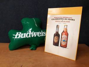 lot 37 image: Budweiser Inflatable Shamrock and New Castle Display Ad