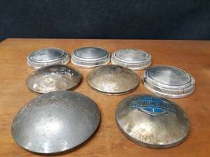 lot 154 image: Lot of (8) Vintage Hubcaps - Chevrolet, Shore Station