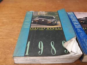 lot 242 image: Lot of (9) 1988, 1989, 1990 Oldsmobile Service Manuals