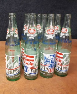 lot 285 image: Lot of (12) Dr. Pepper 1976 Lake Crystal MN FarmFest Commemorative Soda Bottles