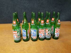 lot 287 image: Lot of (12) 7up 1976 Lake Crystal MN FarmFest Commemorative Soda Bottles