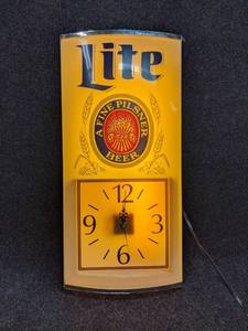 lot 18 image: Miller Lite Lighted Sign with Working Clock
