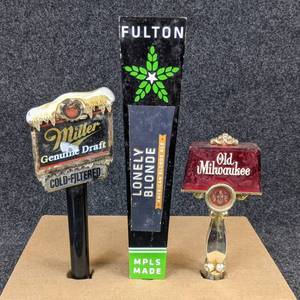 lot 185 image: Lot of 3 Beer Tap Handles - Miller Genuine Draft, Fulton Lonely Blonde, and Old Milwaukee