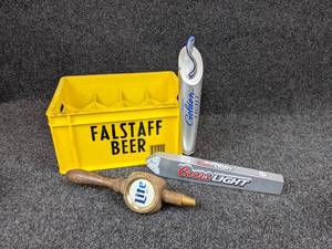 lot 186 image: Lot of 3 Beer Tap Handles - Miller Lite, Coors Light, and Michelob Golden Light in a Small Falstaff Beer Crate