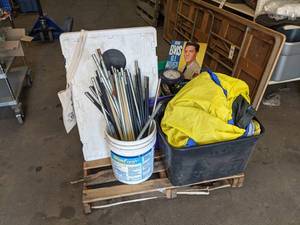 lot 298 image: Pallet lot of Miscellaneous - BAGGO Beanbag Toss Game with Beanbags, Elvis G.I. Blues Record, Clocks, and More