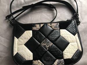 lot 6 image: Coach Quilted Chelsea Handbag