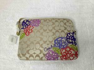 lot 21 image: Coach iPad Case,  Multi-Colored (F63818)