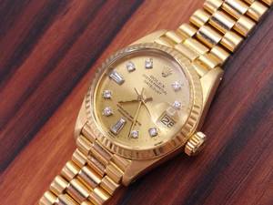 Ladies Rolex DateJust 6917 President 18k Gold and Diamond Bezel Watch