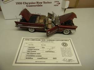 lot 35 image: THE DANBURY MINT 124 SCALE 1958 CHRYSLER NEW YORKER CONVERTIBLE - IN BOX - GREAT PIECE - SEE PICTURES