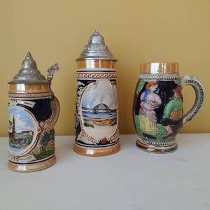 Three Blue and Gold German Steins