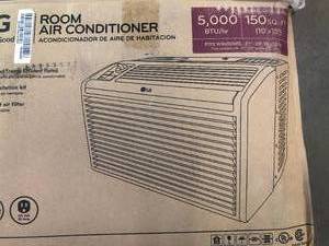 5000 BTU Window Air Conditioner with Manual Controls by LG electronics- open box not used -not tested - see pictures