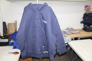 lot 193 image: Key Duck Chore Coat 3X-Large Blue with logo Nuverra Environmental Solutions