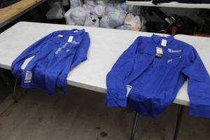 lot 200 image: Lot of ( 2 ) Carhardtt FR Long Sleeve Button Up Shirts Blue with logo Nuverra Environmental Solutions