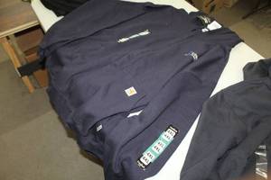 lot 231 image: Carhardtt FR Zip-Up Hooded Sweatshirt 4X-Large Blue with logo Nuverra Environmental Solutions