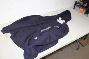 lot 232 image: Carhardtt FR Zip-Up Hooded Sweatshirt X-Large Blue with logo Nuverra Environmental Solutions