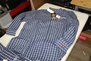 lot 219 image: Lot of ( 2 ) Wrangler FR Long Sleeve Button Up Work Shirts 4X-Large BlueWhite with logo Nuverra Environmental Solutions