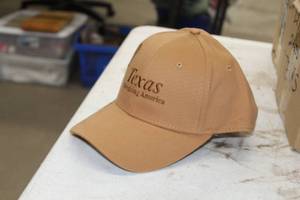 lot 265 image: Lot of ( 23 ) Baseball Caps Light Brown with logo Texas Energizing America