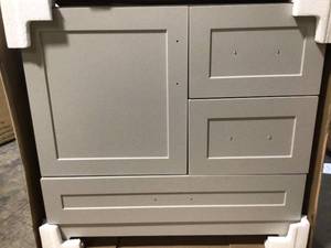lot 29 image: Home Decorator Collection Dorston 36 in. W Bath Vanity in Gray with Solid Surface Vanity Top in Polar Gray with White Sink and Mirror (see all pictures)