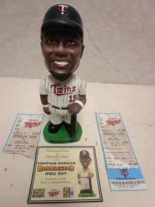 lot 121 image: CHRISTIAN GUZMAN MINNESOTA TWINS BOBBLEHEAD DOLL, W AUTHENTIC COMMEMORATIVE CARD, TICKET STUBS
