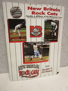 lot 144 image: AUTOGRAPHED NEW BRITAIN ROCK CATS 1998 OFFICIAL SOUVENIR PROGRAM, TORI HUNTER, DOUG MENTKIEWICZ