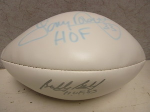lot 148 image: AUTOGRAPHED BOBBY BELL, TONY DORSETT FOOTBALL, HOF, W CERTIFICATE OF AUTHENTICITY, BOX