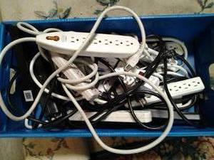 Mail tray full of surge protector p...