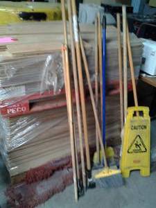 Large lot of brooms, mops, dustmop...