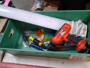 Tray with assorted hand tools, cord...