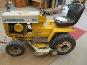 lot 1 image: INTERNATIONAL CUB CADET TRACTOR, MOWER AND SNOW THROWER