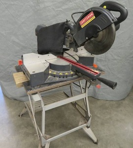 lot 42 image: CRAFTSMAN PROFESSIONAL SAW ON A WORKMATE 225 TABLE.