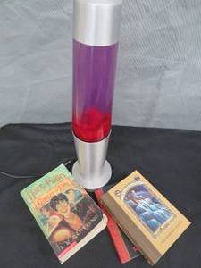 lot 106 image: LARGE LAVA LAMP WITH BOOKS