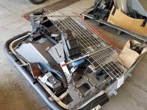 lot 368 image: Lot of Police Squad Car Equipment (on pallet)  - Divider Cages, Brackets, Console Pieces, Wiring Harness, Misc. Squad Car Equipment