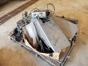 lot 370 image: Lot of Police Squad Car Equipment (on pallet)  - Divider Cages, Kustom Signals,  Brackets, Console Pieces, Wiring Harness, Misc. Squad Car Equipment