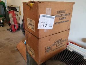 lot 372 image: Lot of (Approximately 24) GE Pedestrian Signal Incandescent All Glass Sealed Beam Lamps (in 2 boxes)