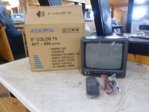 lot 54 image: New Audiovox 9 Color TV